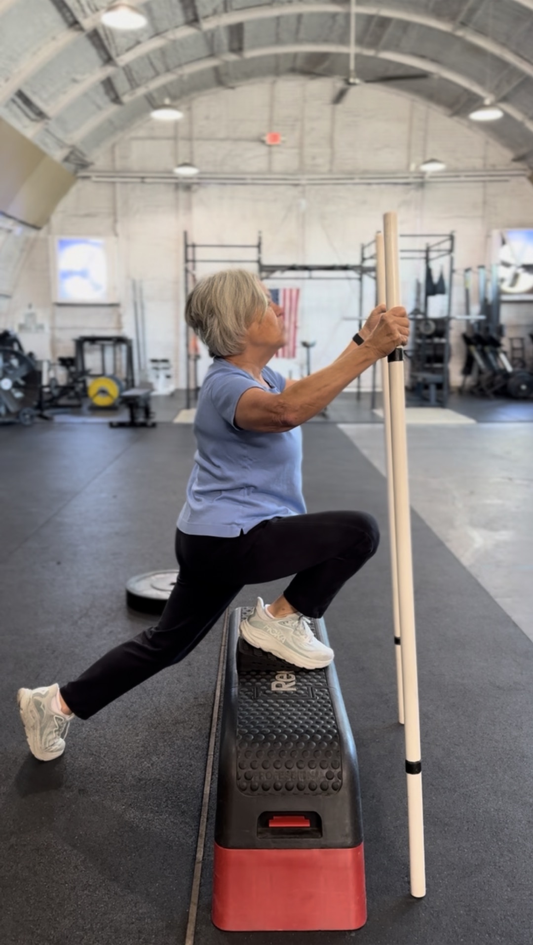 Client working through a split squat