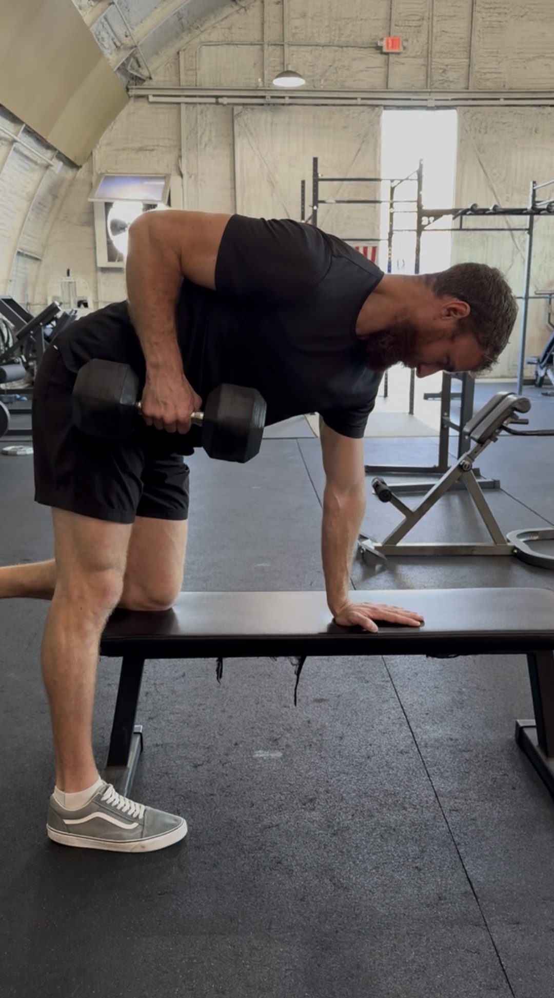 Single-arm dumbbell row during a session