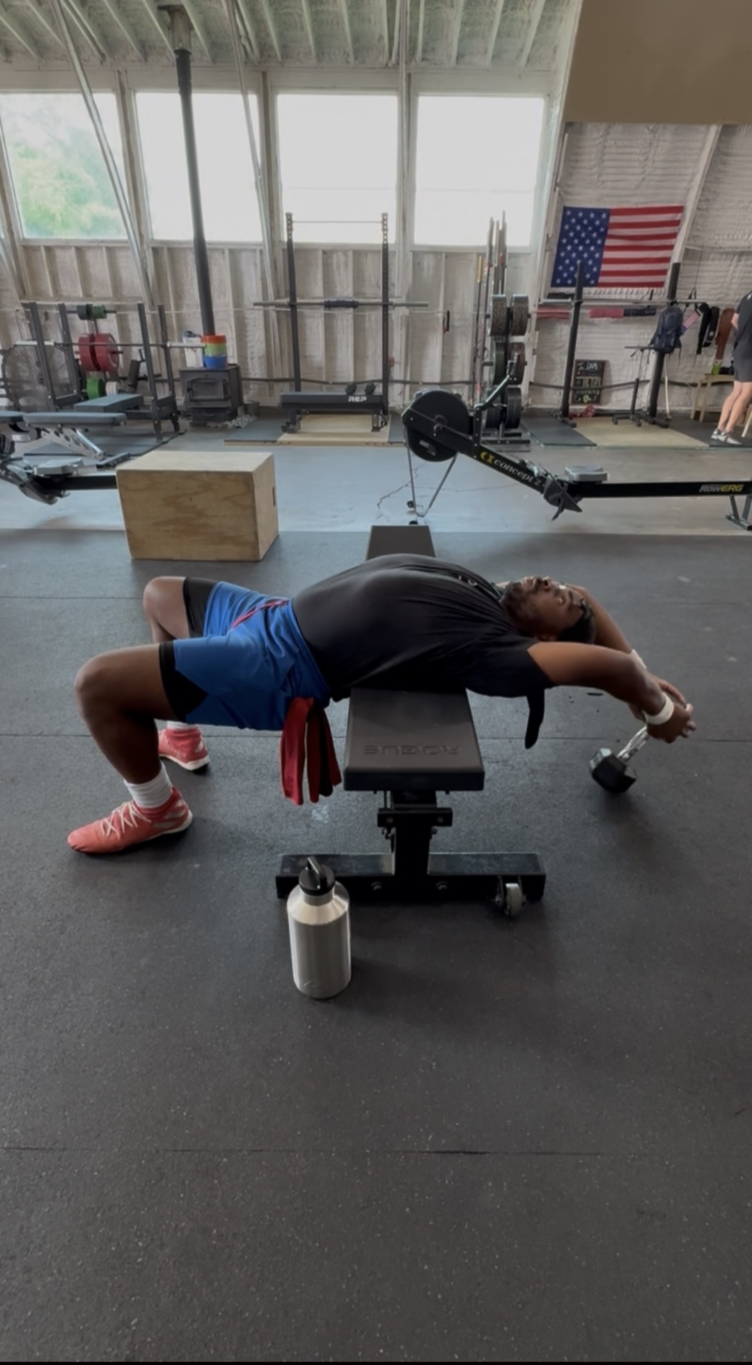 Client performing a dumbbell pullover