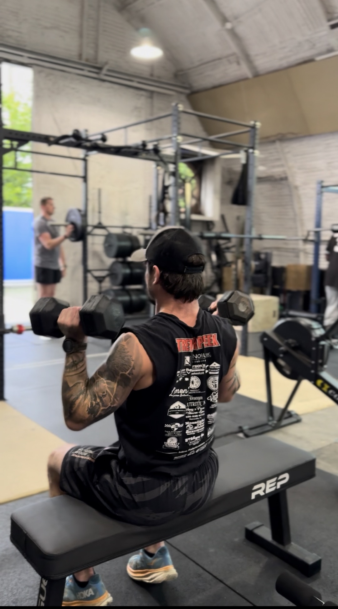 Seated dumbbell shoulder press
